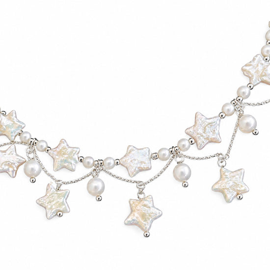 Stardust Waltz Necklace White – star-shaped freshwater pearls on pure white background