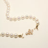 Iris Clasp Pearl Necklace