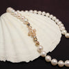 Iris Clasp Pearl Necklace