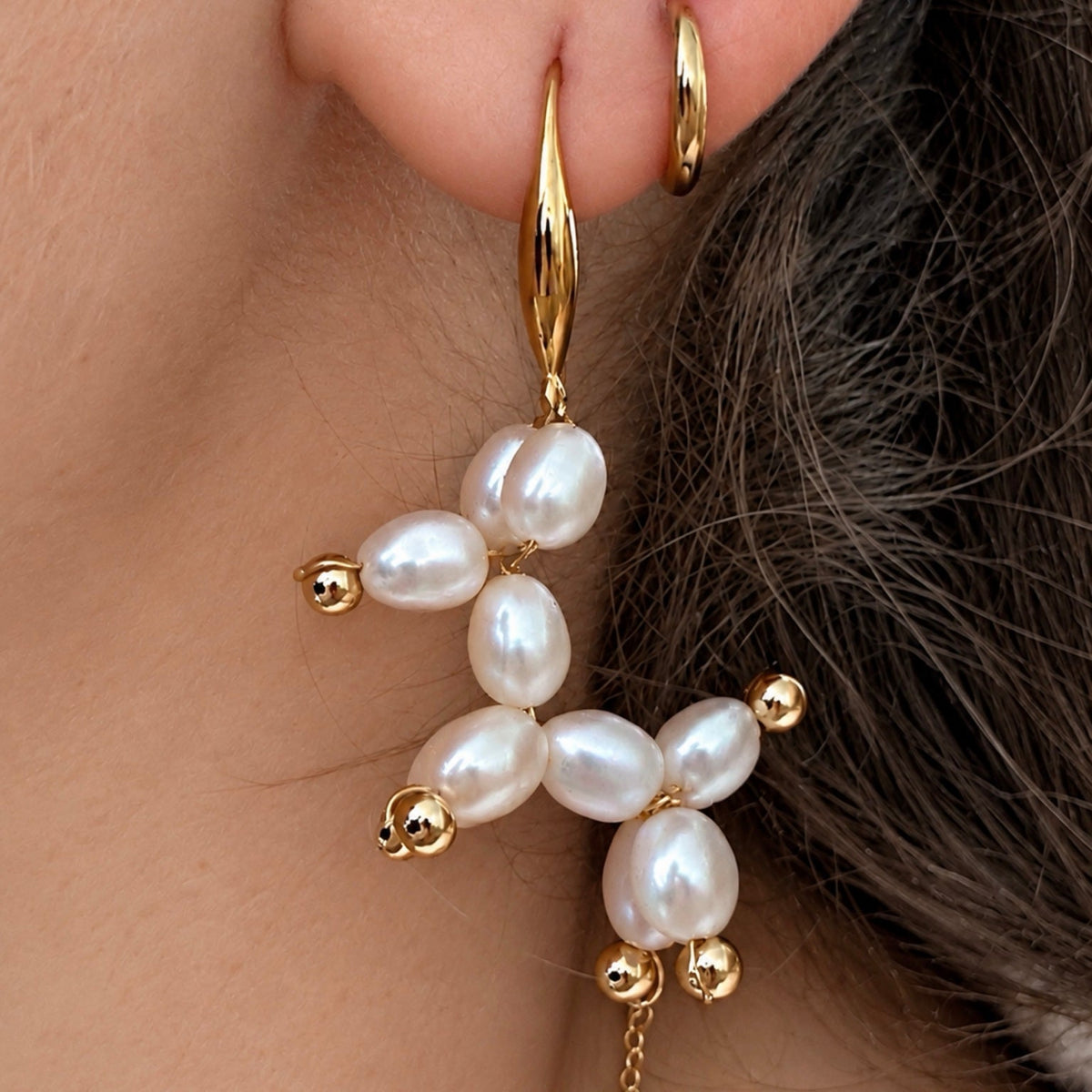 Ivory White Balloon Dog pearl earrings worn