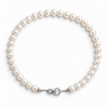 Étreinte de Perle Pearl Necklace – full view of ivory freshwater pearls and silver-tone teardrop clasp