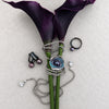 Midnight Orbit pearl jewellery styled with purple calla lilies