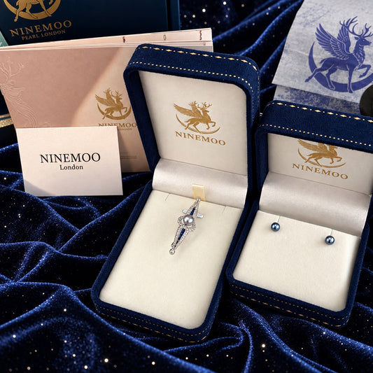 Nacre Gris Ligne brooch and Nacre Noire pearl studs in velvet boxes