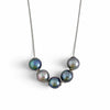 Nacre Noire five pearl necklace white background