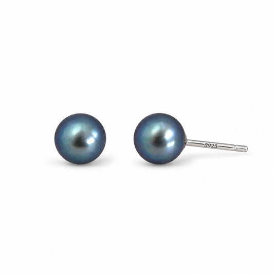 Nacre Noire pearl studs white background