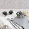 Nacre Noire petal ring jewellery art