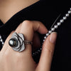 Nacre Noire petal ring worn detail
