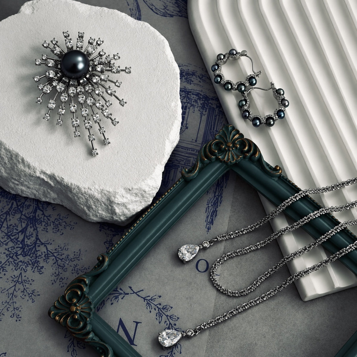 Nacre Noire starburst brooch art