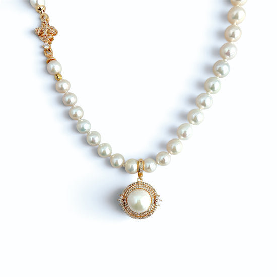 Aurelia Halo pendant paired with Iris Clasp Pearl Necklace