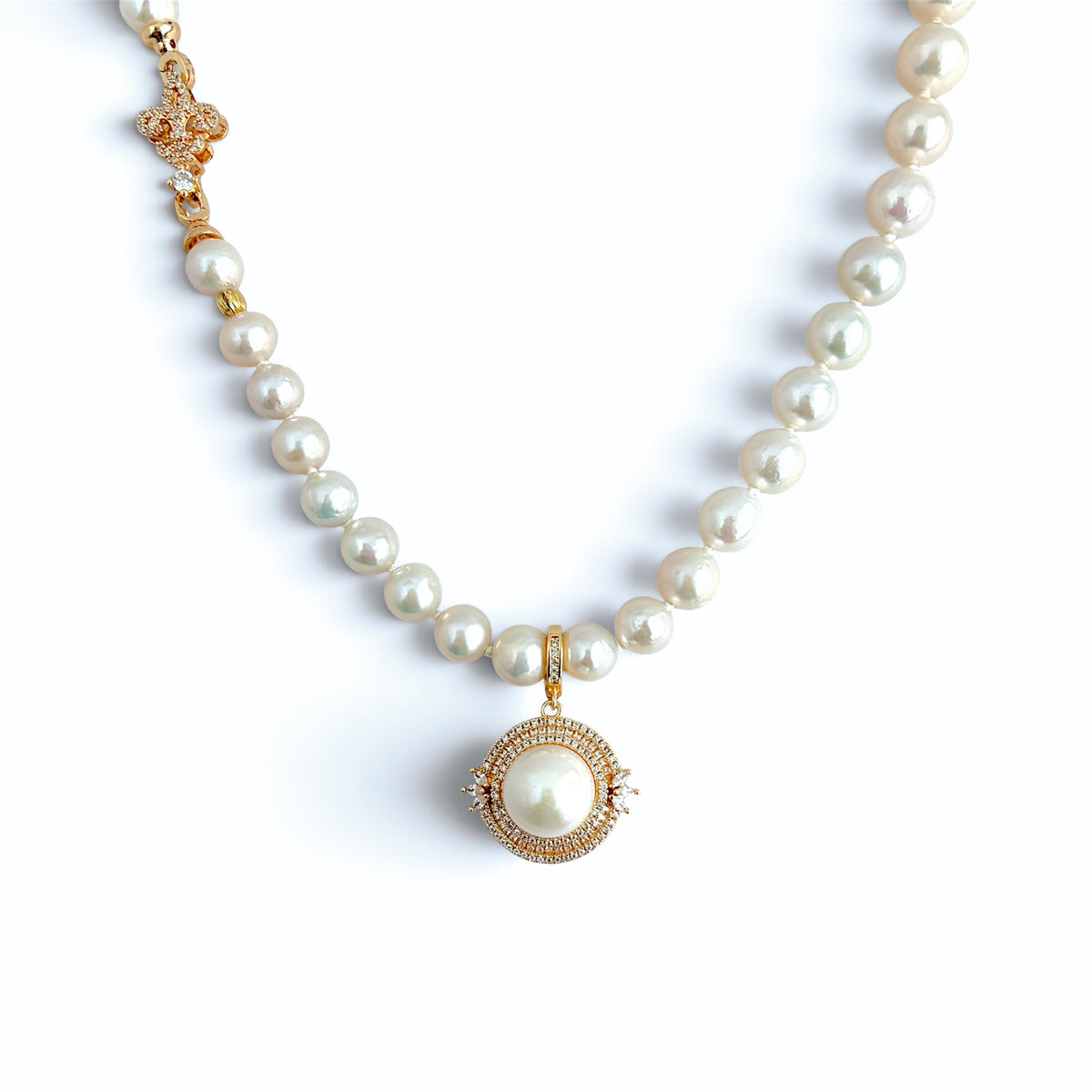 Aurelia Halo pendant paired with Iris Clasp Pearl Necklace
