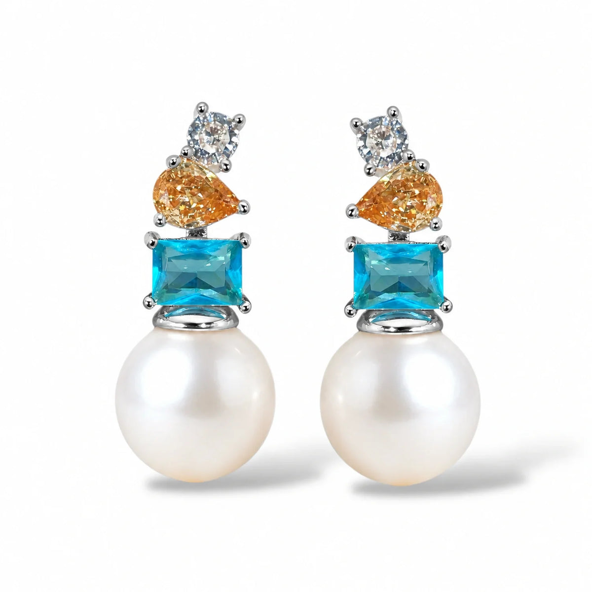 NINEMOO Azure Muse Earrings – silver-tone fittings with freshwater pearls and champagne and aqua Cubic Zirconia, front view