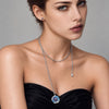 Azure Orbit saltwater pearl brooch with blue and clear cubic zirconia