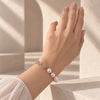 Ballet Rosé En Pointe bracelet worn on a model's wrist