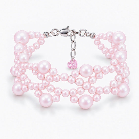 Ballet Rosé woven pink freshwater pearl bracelet with sterling silver fittings and a heart-shaped lab-grown pink diamond
