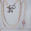 Blush Butterfly Freshwater Pink Pearl Long Necklace by NINEMOO – detail view