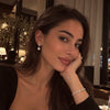 Model wearing NINEMOO Celestial North Star Pearl Earrings