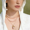 Lumière Gold Blush Pearl Clip Earrings by NINEMOO – detail view