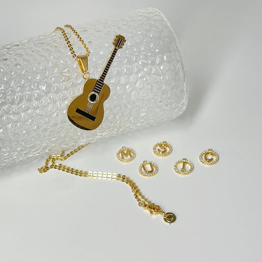Enchanted Woods Strum Guitar Necklace by NINEMOO – detail view
