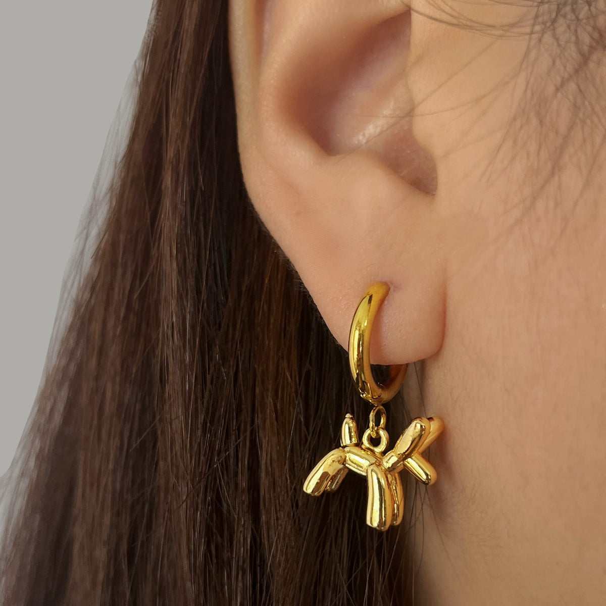 Golden Balloon Dog Hoops Earrings by NINEMOO – alternate view