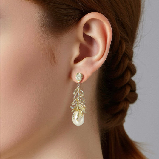 Golden Feather Baroque Pearl Earrings by NINEMOO – detail view