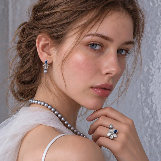 Nacre Gris Arabesque grey freshwater pearl earrings worn with bridal styling