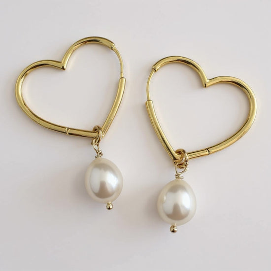 Pearl Huggie Heart Earrings by NINEMOO – product image