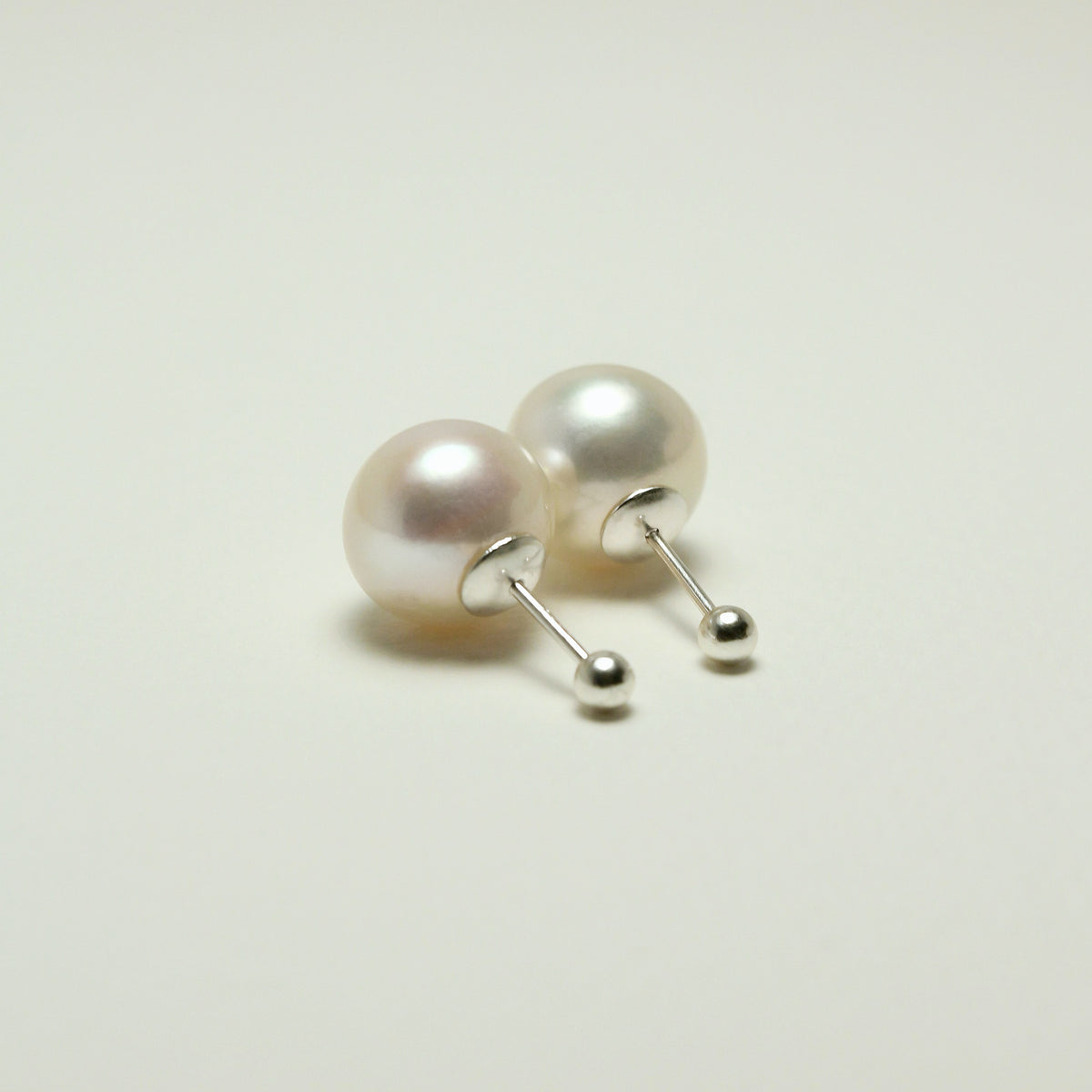 Pure Orb Pearl Studs Earrings by NINEMOO – product view 6