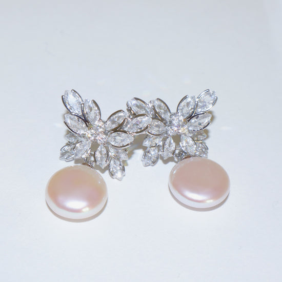 Rainbow Glow Pearl Earrings by NINEMOO – product image