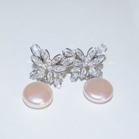 Rainbow Glow Pearl Earrings by NINEMOO – product image