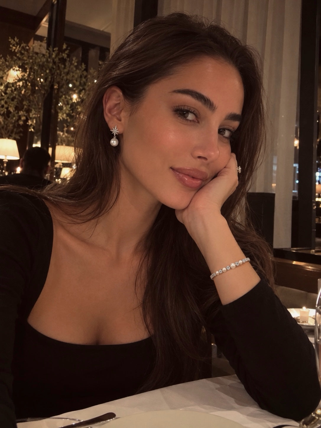Evening styling with Celestial North Star pearl earrings, pearl tennis bracelet and a silver-tone ring