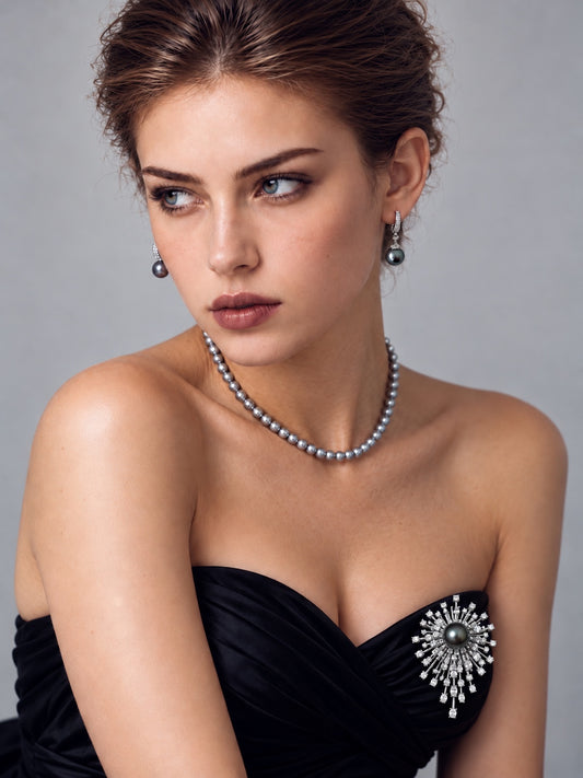 Model wearing the Nacre Noire Starburst Pearl Brooch, showing the complete brooch
