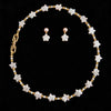 NINEMOO Starry Veil Pearl Necklace – white star pearls and gold-tone fittings on black background; matching earrings shown separately