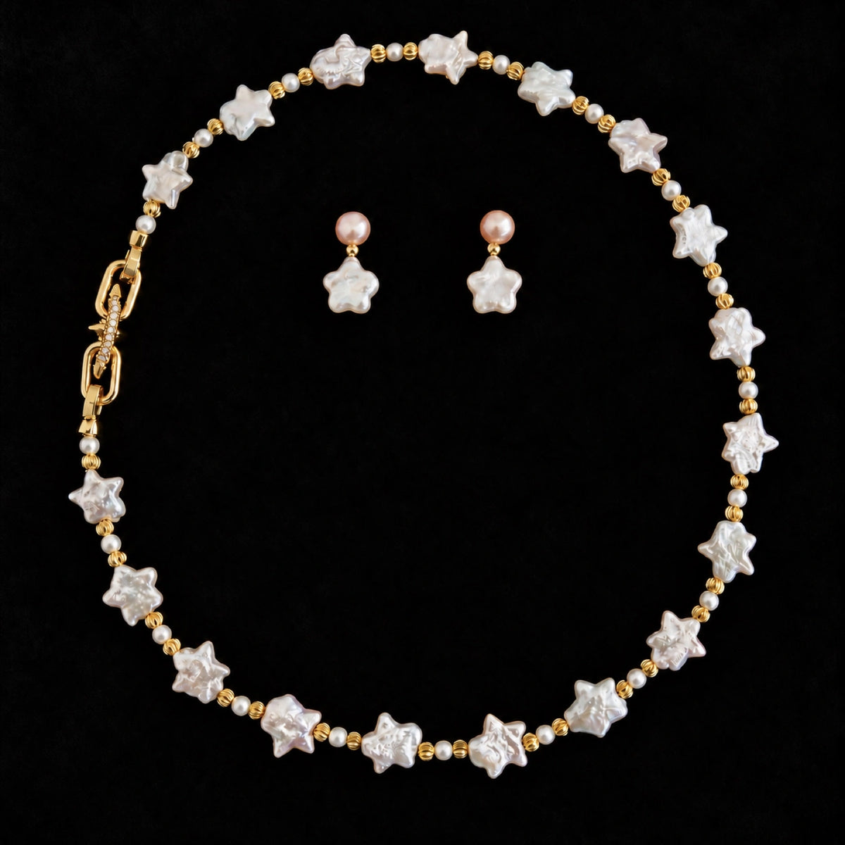 NINEMOO Starry Veil Pearl Necklace – white star pearls and gold-tone fittings on black background; matching earrings shown separately