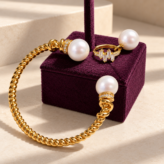 NINEMOO Titan Double Pearl Cuff and Prisme clear cubic zirconia pearl hoop earrings styled together on burgundy velvet.